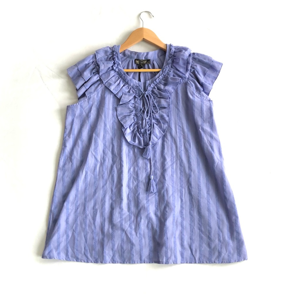 New. Lilac blouse. Size M.